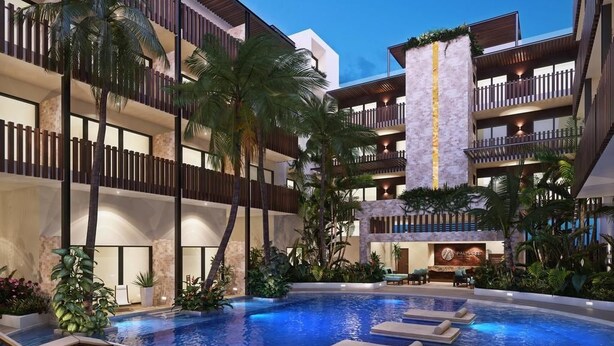 A hotel with a swimming pool, palm trees, and a modern architectural design. - Palmares 104 by Tripintravel (Playa del Carmen)