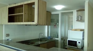 Apartment, 2 Bedrooms, 2 Bathrooms | Private kitchen | Full-size fridge, microwave, oven, stovetop - 47.- HNA Mirador El Faro (La Serena)