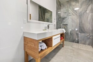Elite Room, 1 King Bed, Non Smoking, Resort View | Bathroom | Shower, rainfall showerhead, towels, soap
