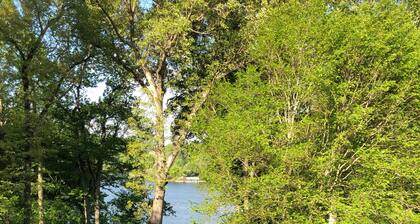 Charming Waterfront Home with Sunset Views & Deep Water on Wide Cove.