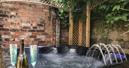 Keskuskaupunki, jossa poreallas poreallas ja 3D-TV-huone