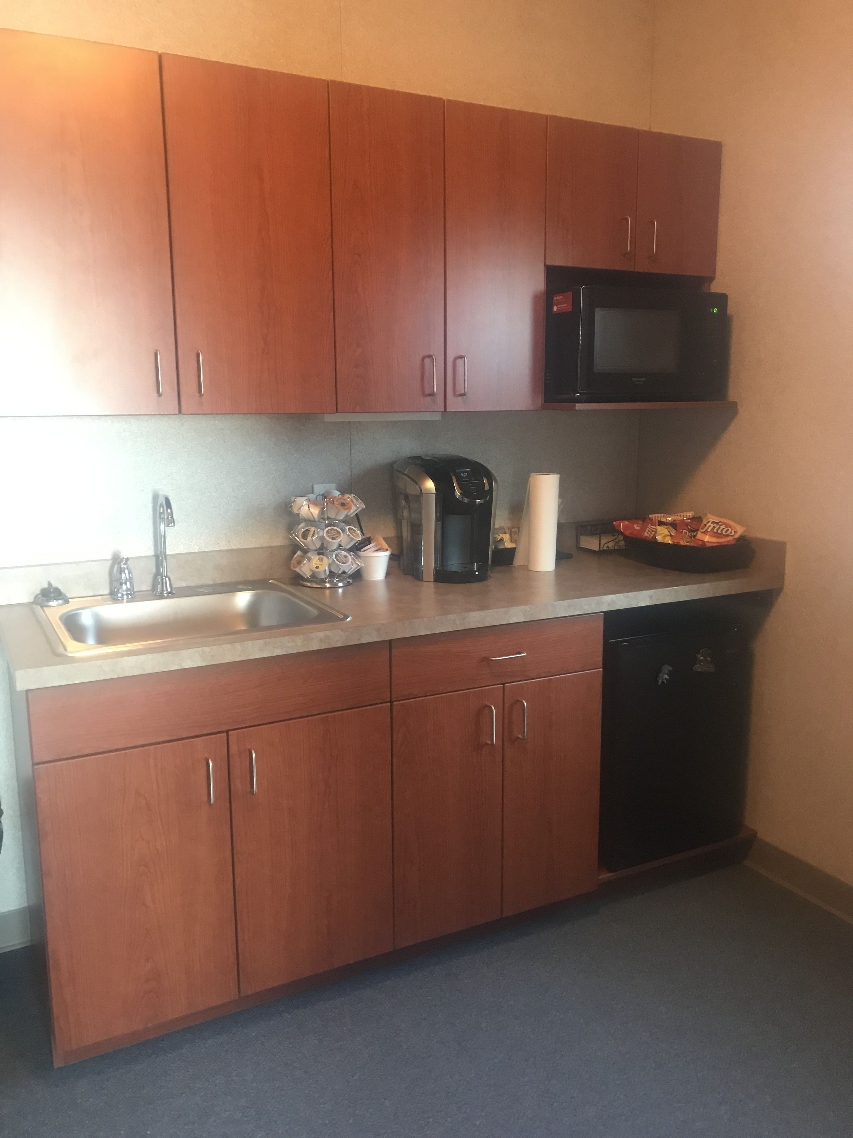 executive room w/ double size bed, large desk & kitchenette | individually furnished, laptop workspace, free wifi, bed sheets