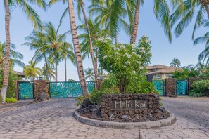 Welcome to Hali Kai, where a beautifully maintained entrance sets the tone for a serene tropical getaway.