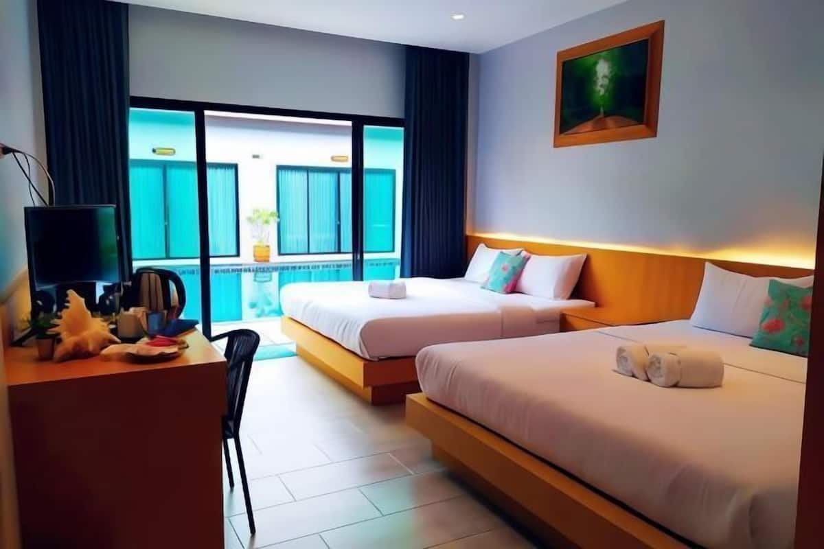 Desk, blackout curtains, free WiFi, bed sheets