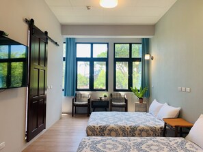 Deluxe Quadruple Room, 1 Bedroom | Bathroom | Shower, rainfall showerhead, hair dryer, slippers