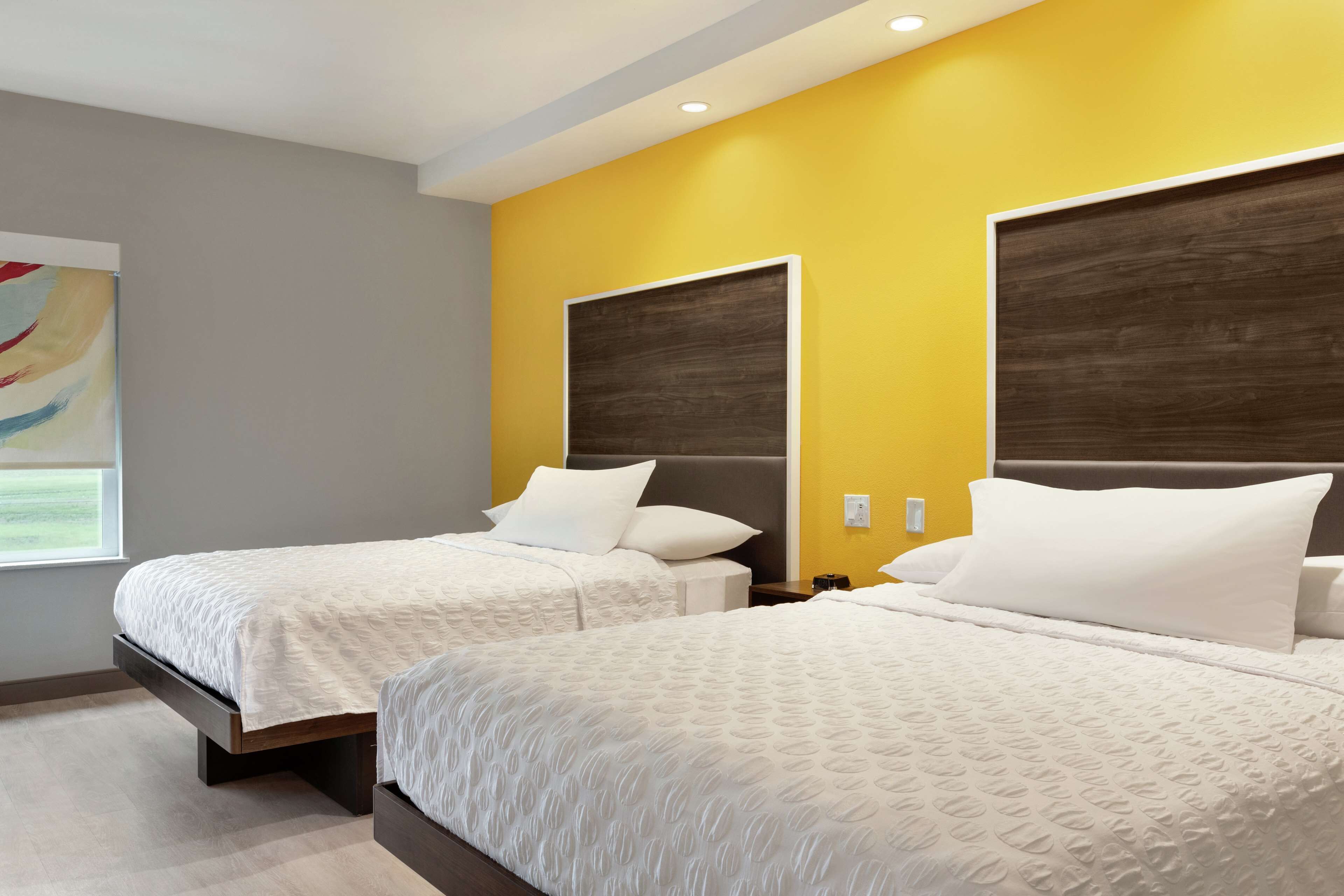 premium bedding, desk, blackout curtains, iron/ironing board