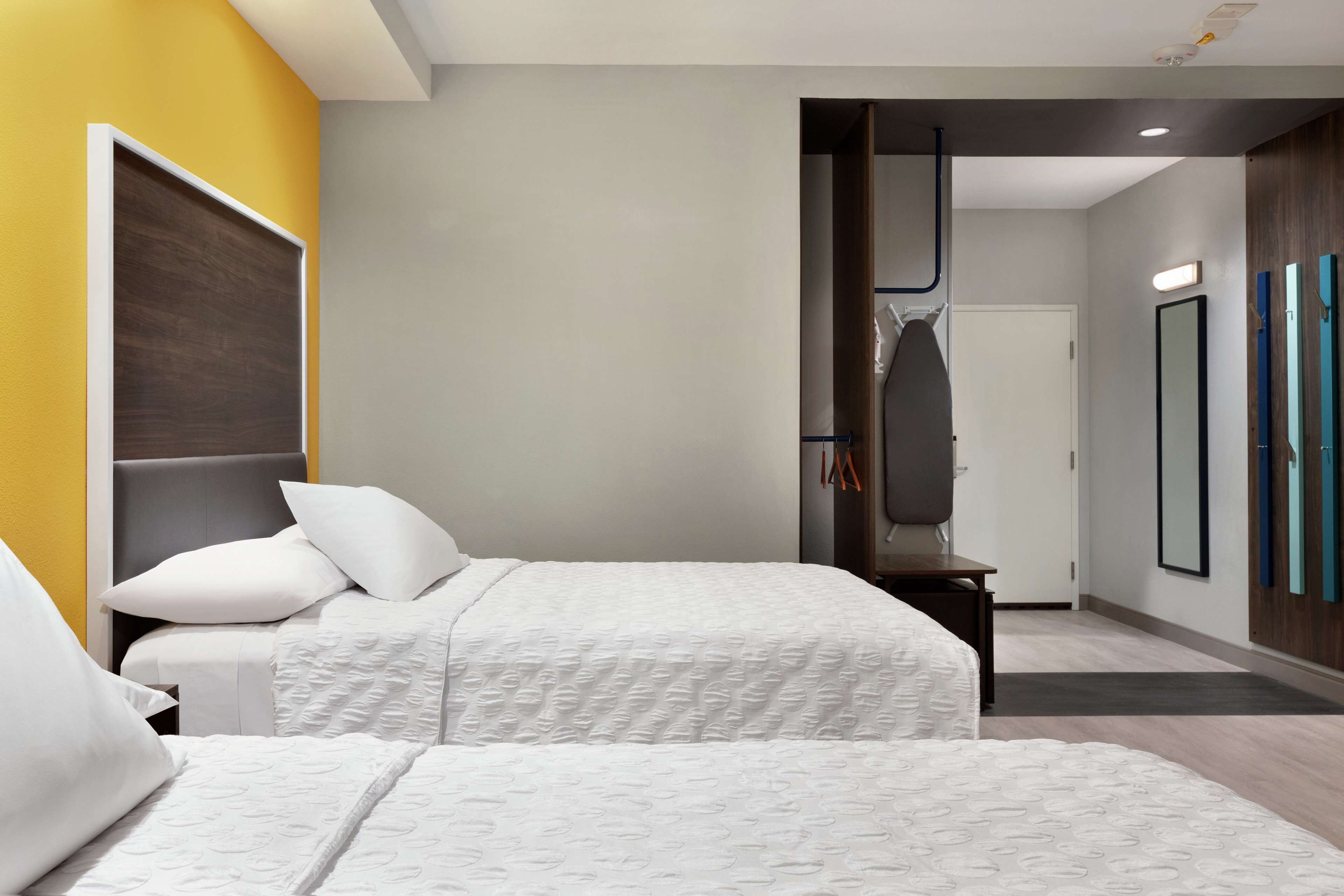 premium bedding, desk, blackout curtains, iron/ironing board