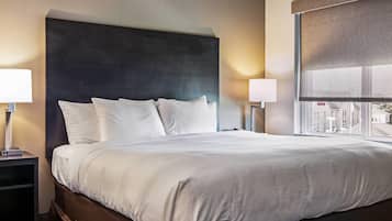 Desk, laptop workspace, blackout curtains, iron/ironing board