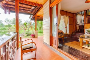 Suite, 1 King Bed | Terrace/patio - Sinouk Coffee Resort (Paksong)