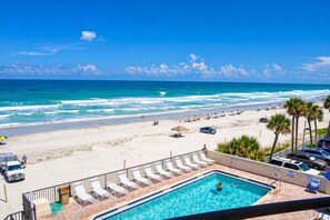 On the beach, sun-loungers, beach towels - Sand Dollar Spectacular, Pool and Balcony open, Breathtaking Direct Ocean Views! (Daytona Beach Shores)