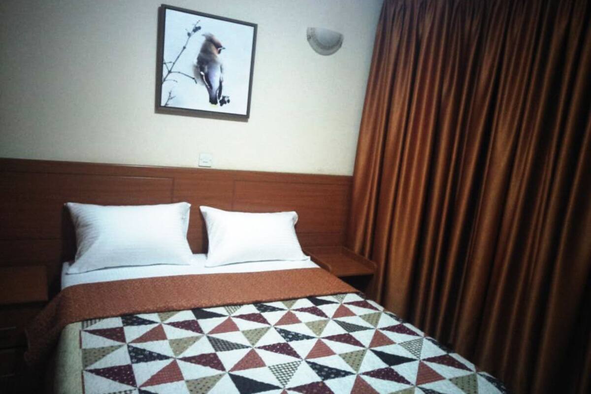 Habitación doble Elite, 1 cama Queen size, para no fumadores | Ropa de cama de alta calidad, camas extra y wifi gratis