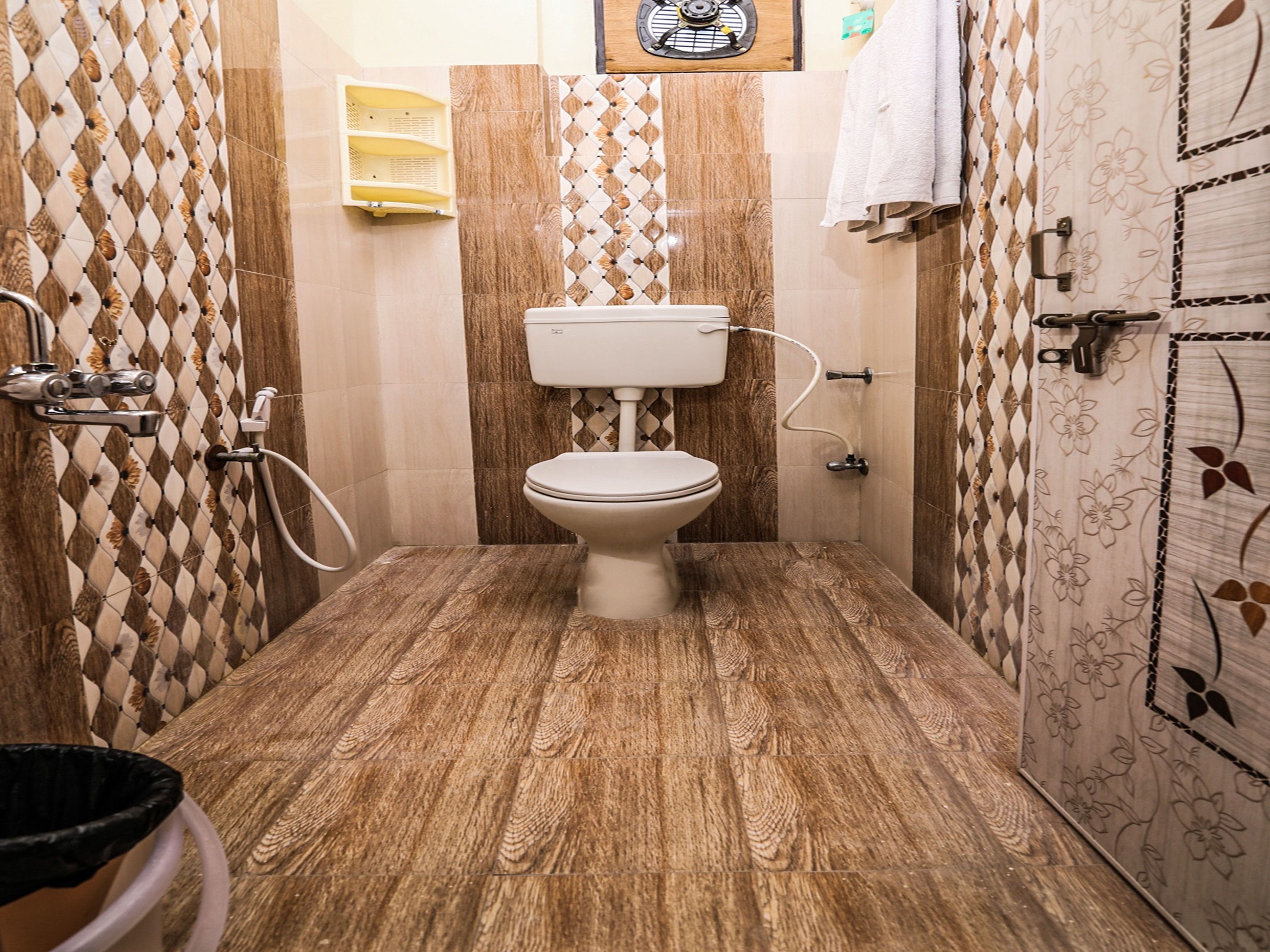 shower, rainfall showerhead, hair dryer, towels