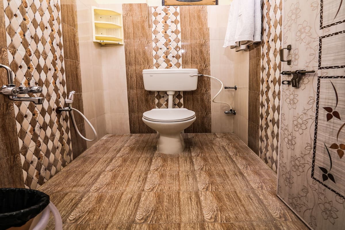 shower, rainfall showerhead, hair dryer, towels