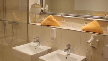 Shower, hair dryer, bathrobes, towels