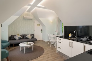 1-bed Loft Superior Suite | Area keluarga | TV layar datar