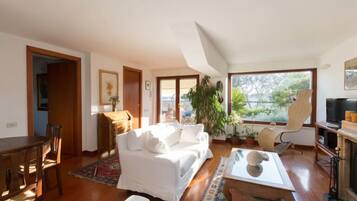 Apartment, 1 Bedroom | Living room | LCD TV