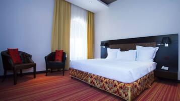 Deluxe-Suite, 1 Schlafzimmer | Hochwertige Bettwaren, Minibar, Zimmersafe, individuell dekoriert