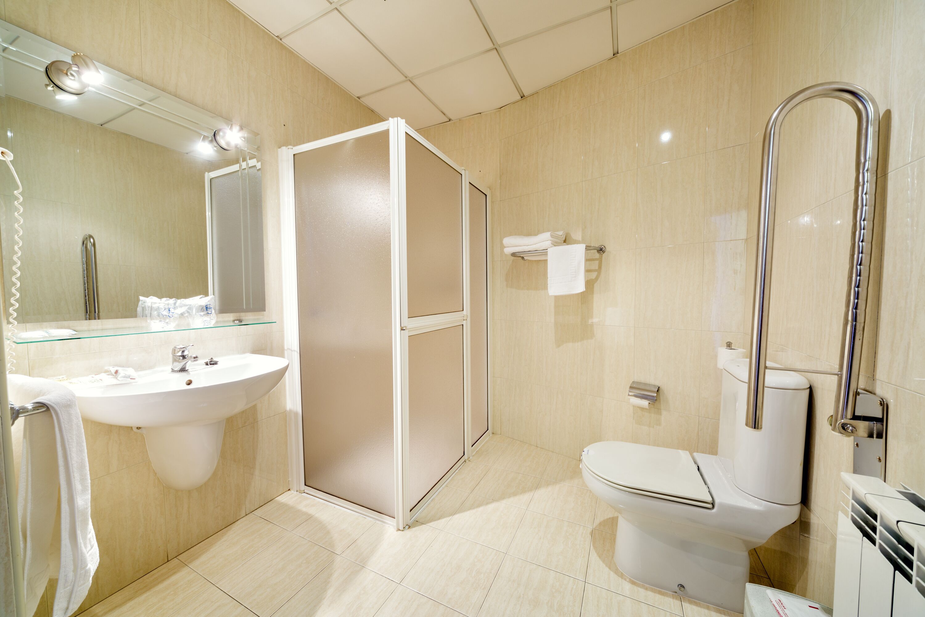 superior twin room | bathroom | free toiletries, hair dryer, slippers, towels
