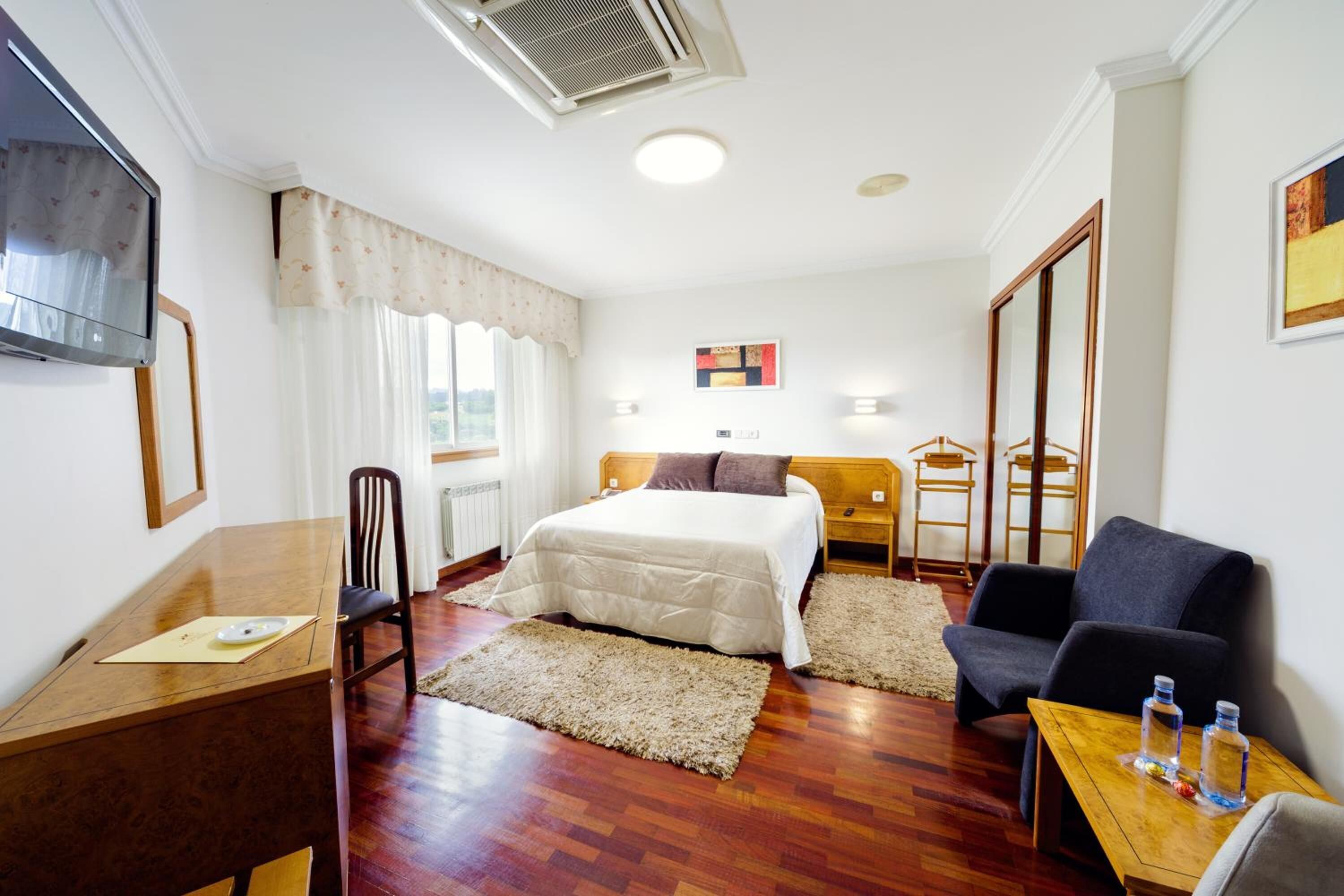 down duvets, desk, laptop workspace, blackout curtains