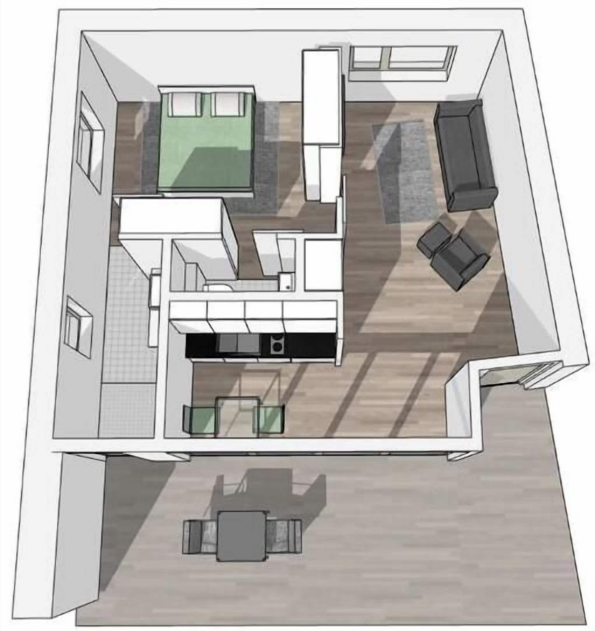 Un plan d’étage d’une chambre d’hôtel comprenant un coin cuisine, un espace repas, un coin salon avec un canapé et des fauteuils, et une petite table.