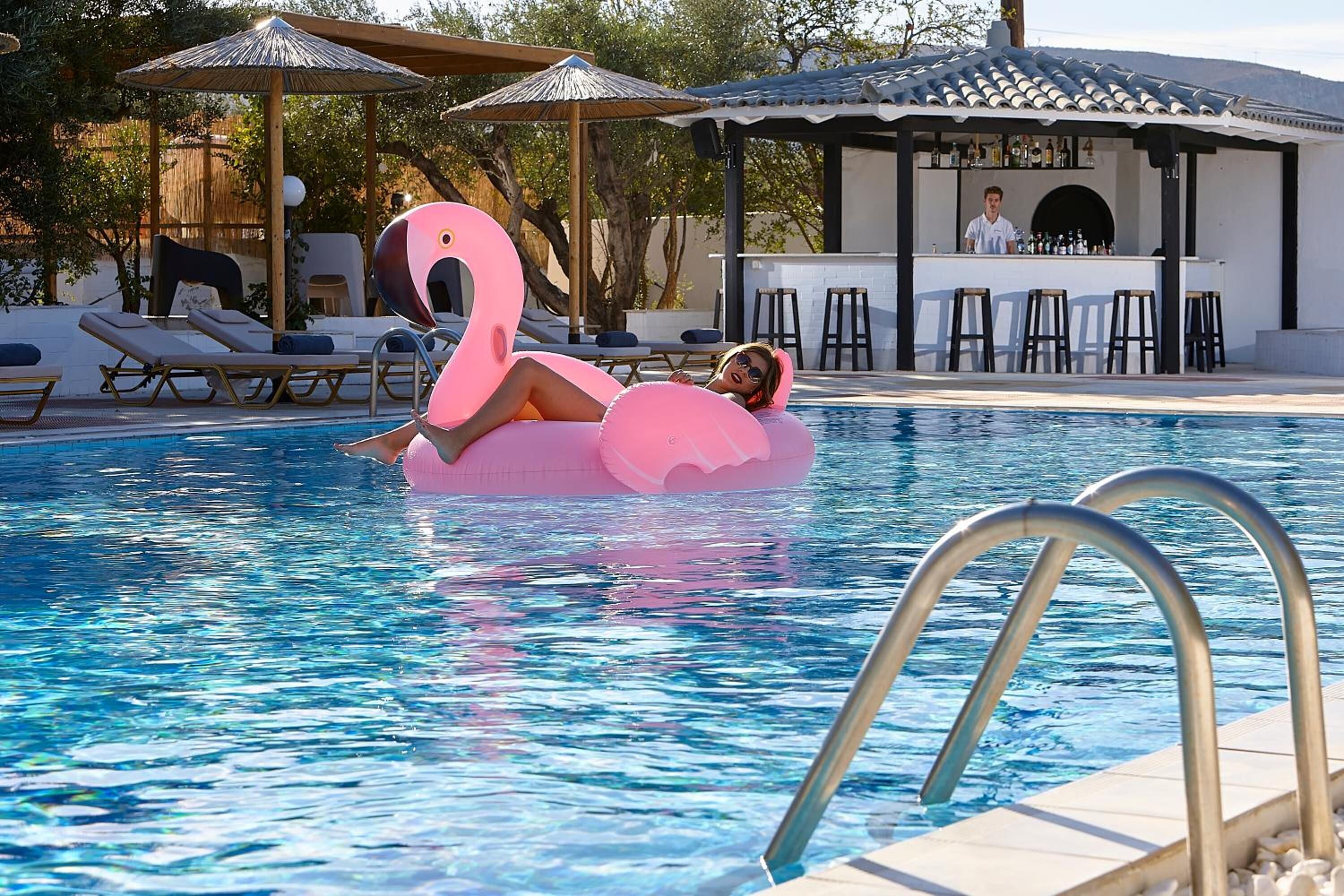 seasonal outdoor pool, pool umbrellas, pool loungers