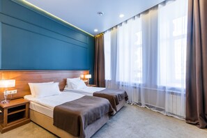 Deluxe Triple Room | Premium bedding, down comforters, blackout drapes, soundproofing - Hotel Eliseevskiy (St. Petersburg)