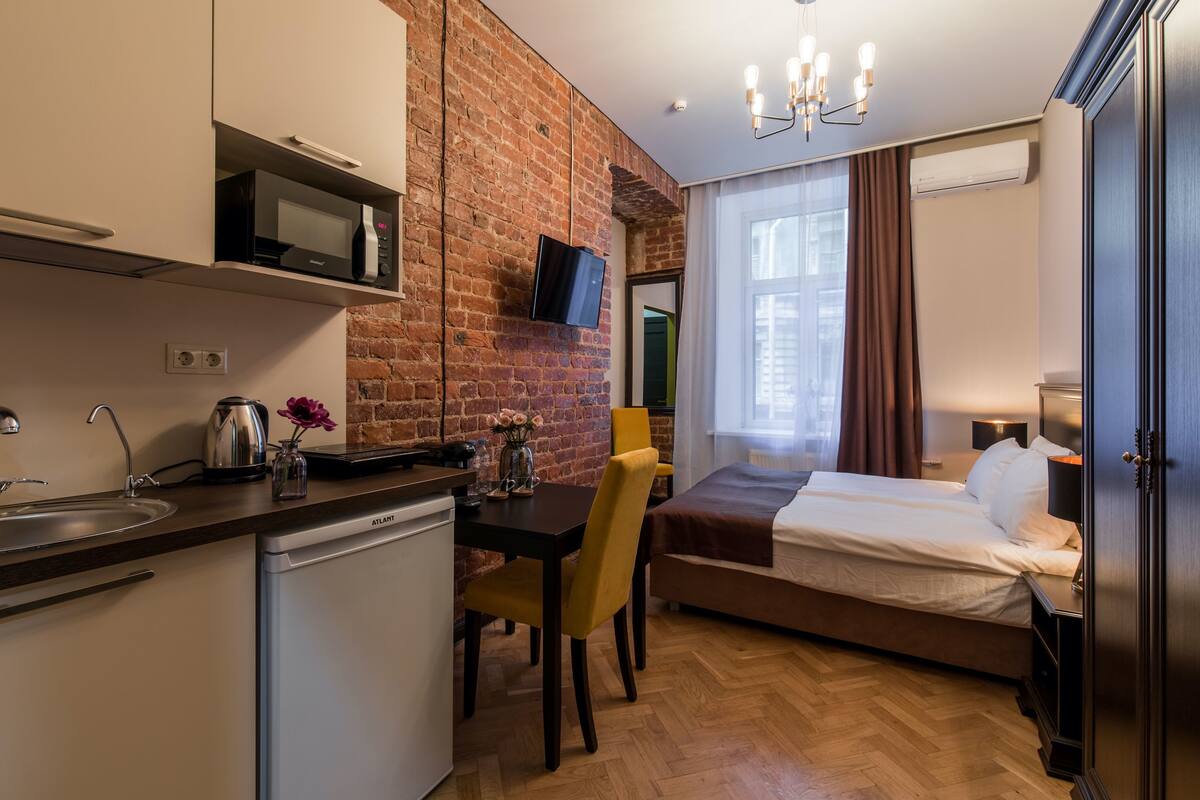 Comfort Studio | Premium bedding, down comforters, blackout drapes, soundproofing