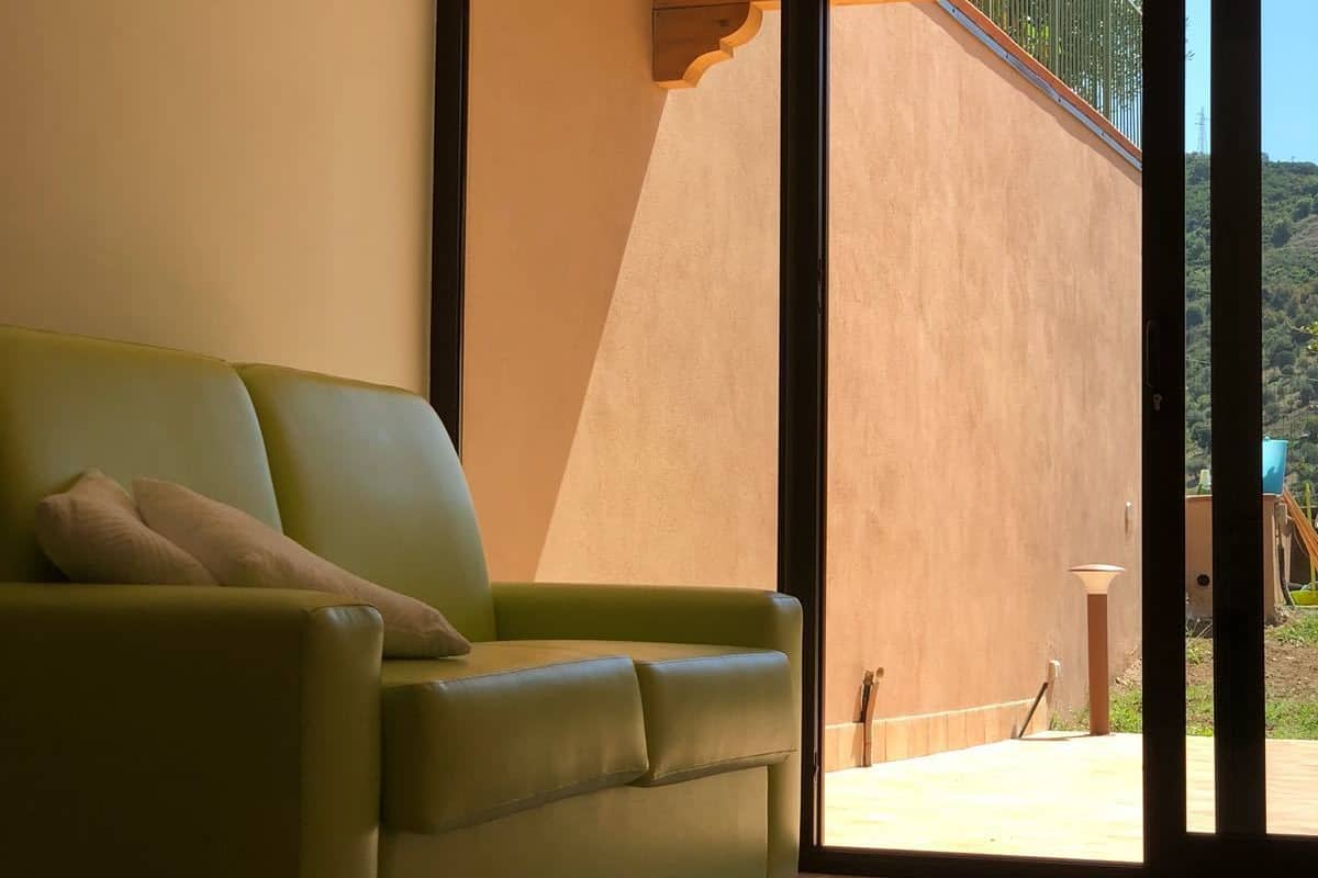 Family Room, 2 Bedrooms, Garden View | Living room | Flat-screen TV
