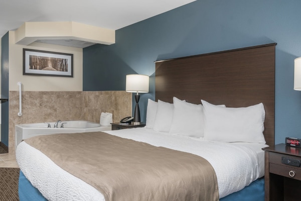 Suite, 1 letto king, non fumatori | Una scrivania, tende oscuranti, insonorizzazione, ferro/asse da stiro