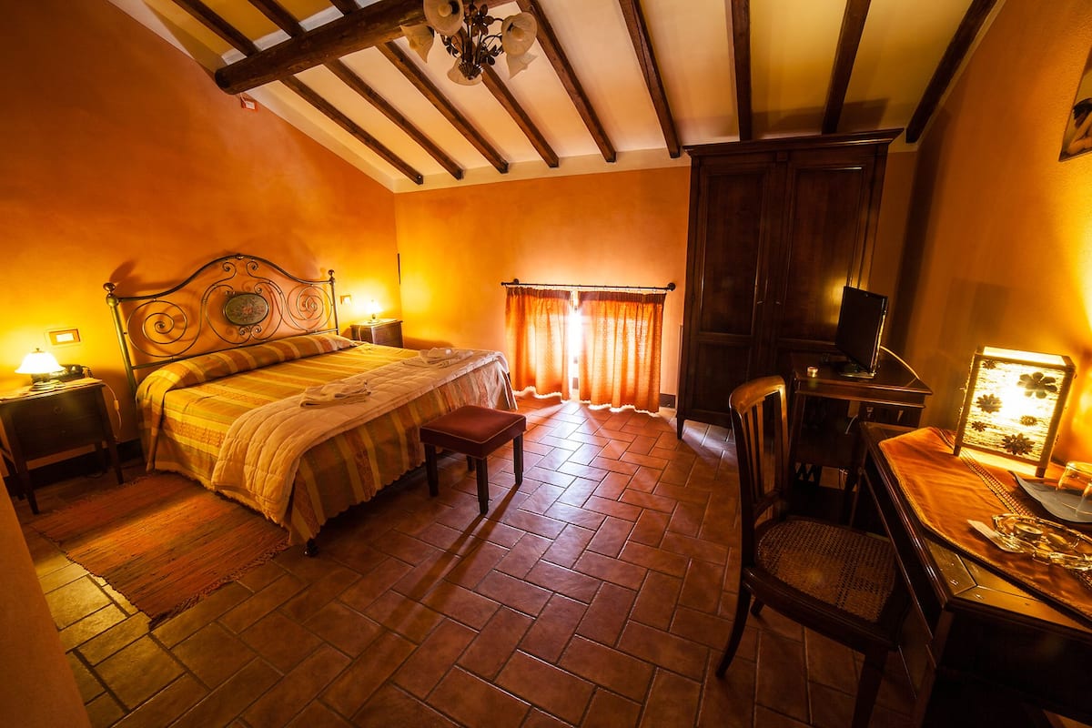 classic room | 1 bedroom, minibar, in-room safe, individually furnished