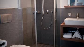 Combined shower/tub, hair dryer, towels, soap