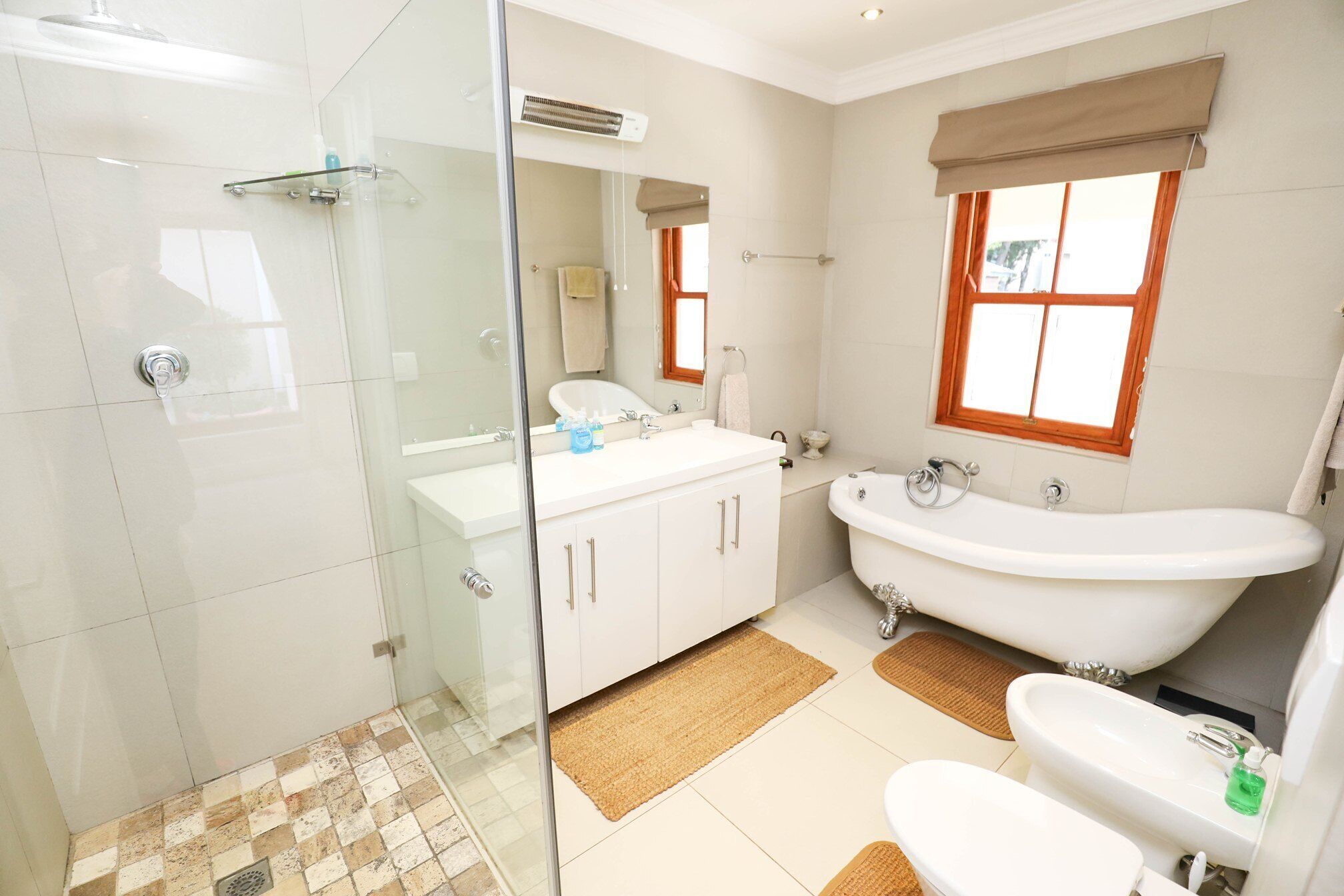Bathtub, hair dryer, bidet, towels
