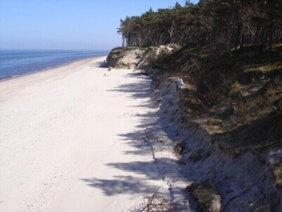 Cottage with fireplace, garage, Wi-Fi, welcome 50m from the beach, pets