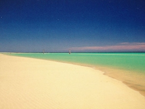 Beach nearby, sun loungers