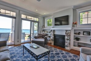 Smart TV, fireplace, DVD player, books