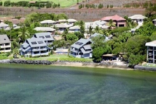 Location, Location, Location.  You can't get closer to the ocean for this price