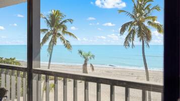 On the beach, sun loungers, beach towels