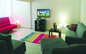Apartment | Living area | Flat-screen TV - Herzelya Getaway (Herzliya)