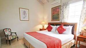 Apartamento conforto, 2 quartos | 1 quarto, roupas de cama premium, cofres nos quartos