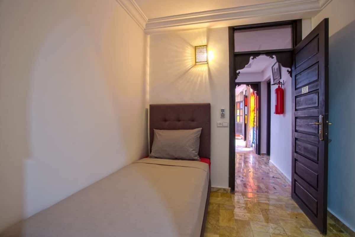 Premium bedding, blackout curtains, iron/ironing board, bed sheets