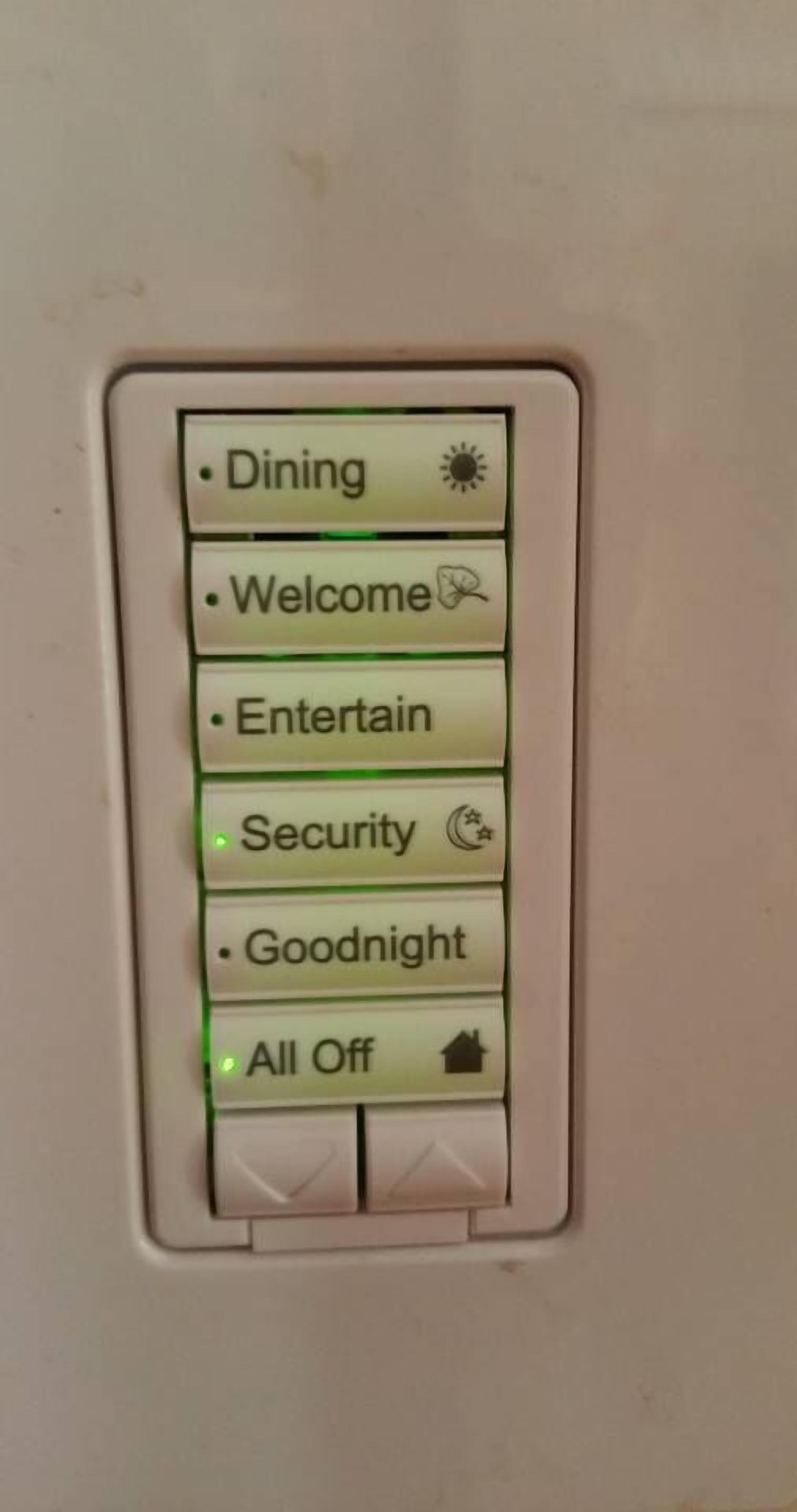 A control panel with buttons labeled "Dining," "Welcome," "Entertain," "Security," "Goodnight," and "All Off."