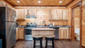 Luxury Cottage, 2 Queen Beds, Non Smoking | Private kitchen | Coffee/tea maker, dining tables