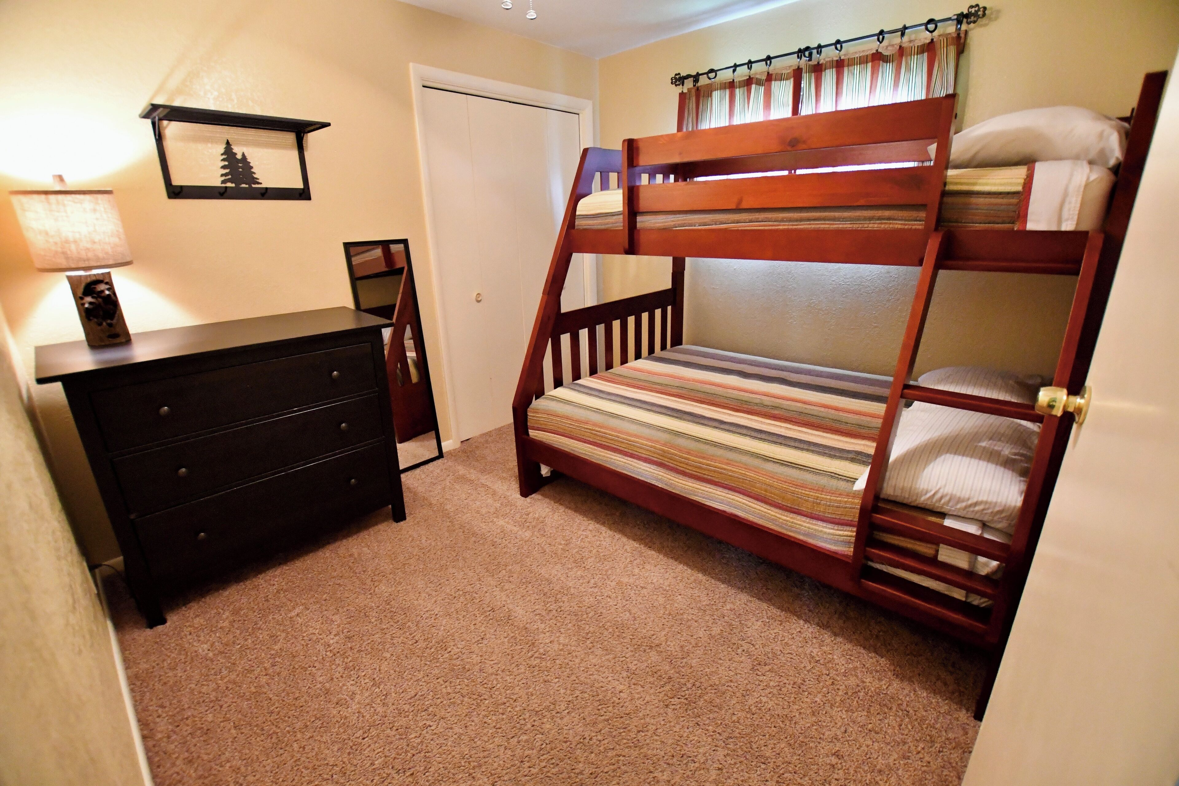 2 bedrooms, memory foam beds, iron/ironing board, travel crib