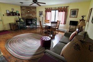 Smart TV, fireplace, books