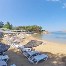 On the beach, free beach cabanas, beach umbrellas