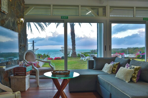 Deluxe Villa, Multiple Beds, Accessible | Living area | Flat-screen TV - Boutique vllla on the rocks (Trou d'Eau Douce)