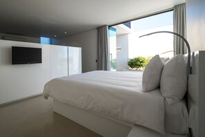 Ropa de cama de alta calidad y minibar