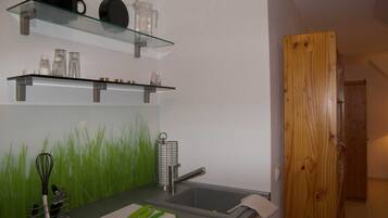 Fridge, coffee/tea maker, electric kettle, toaster