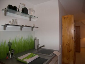 Fridge, coffee/tea maker, electric kettle, toaster