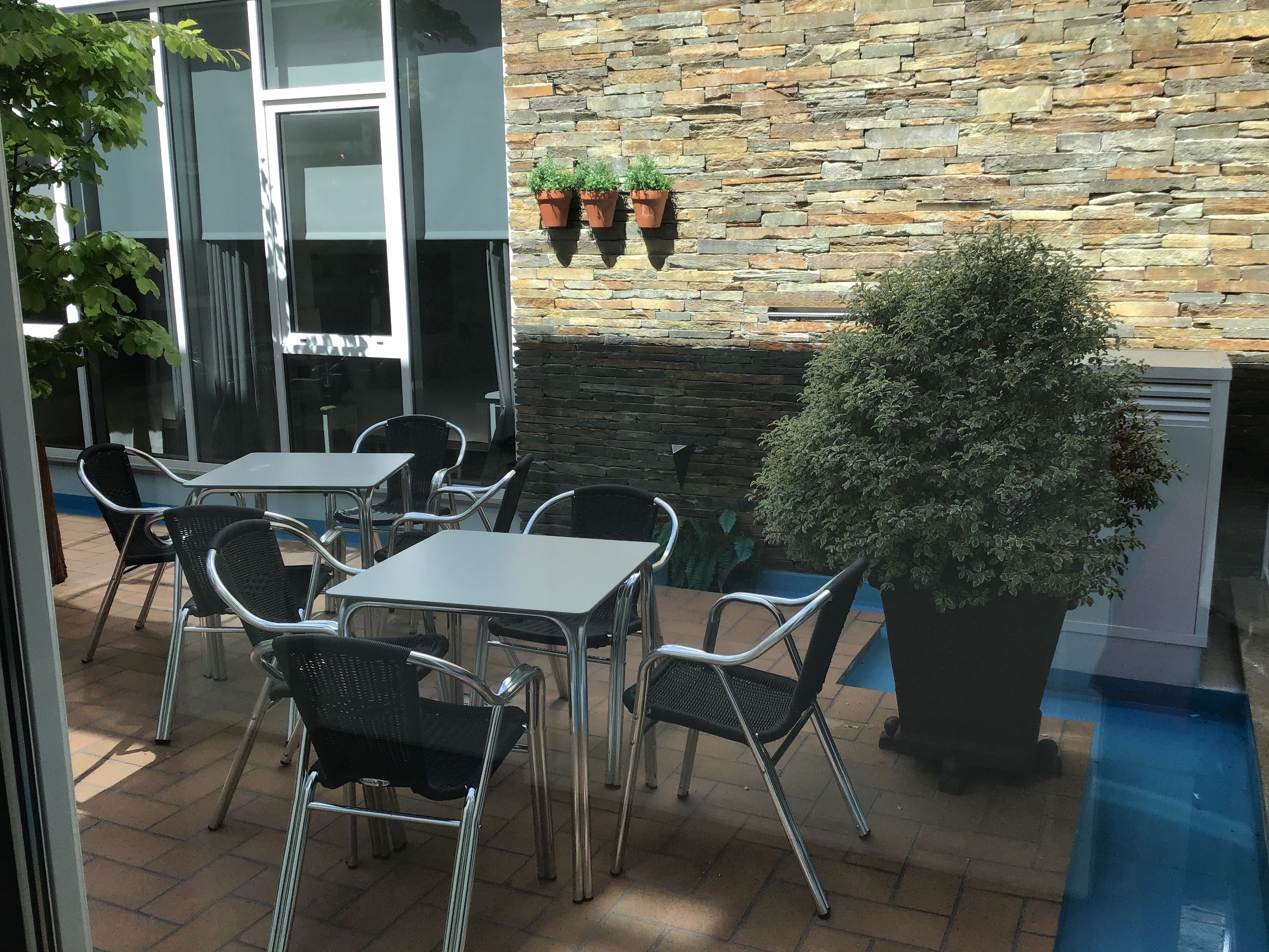 comfort room, 3 single beds, non smoking | living area | flat-screen tv